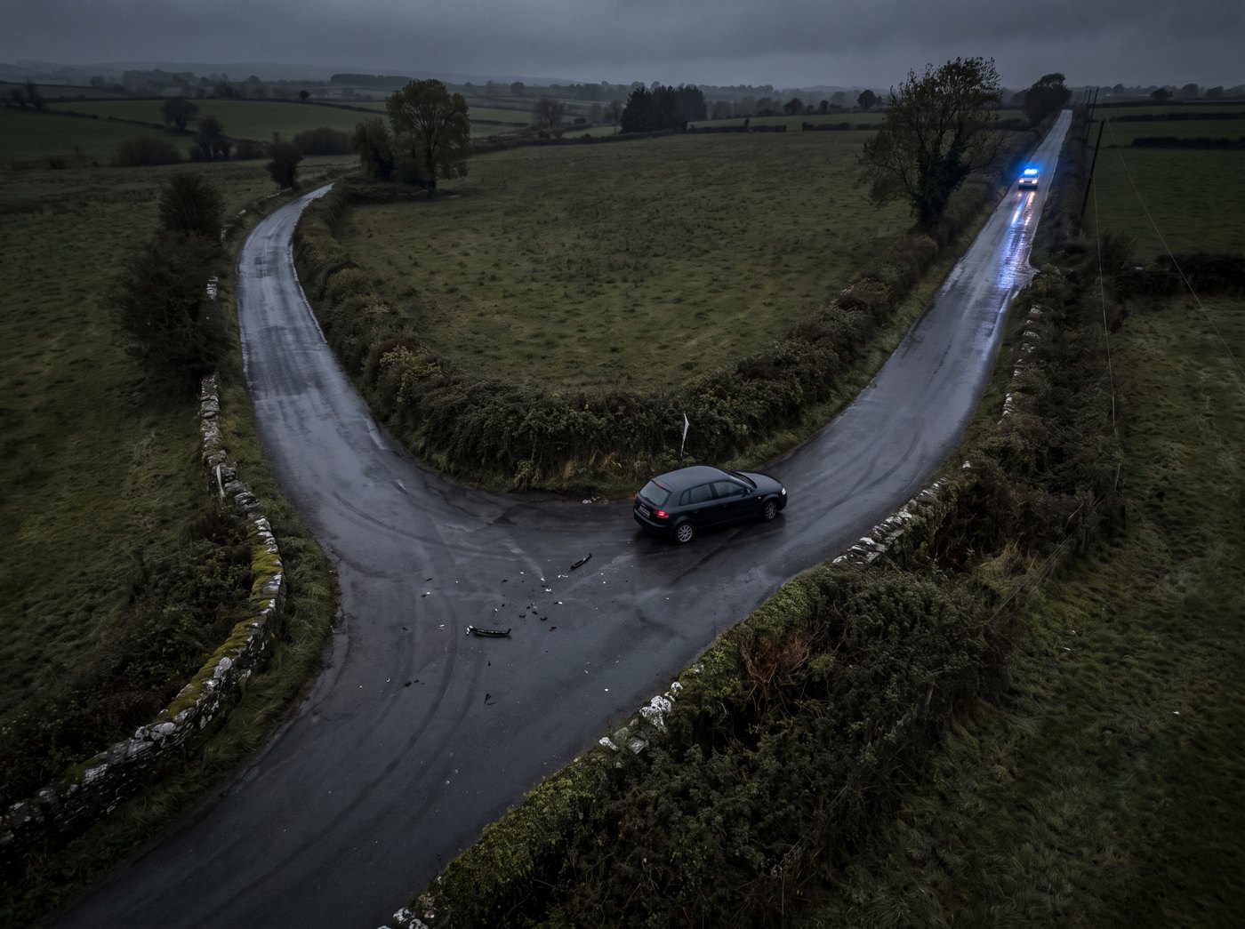 Aerial view of a road collision at night